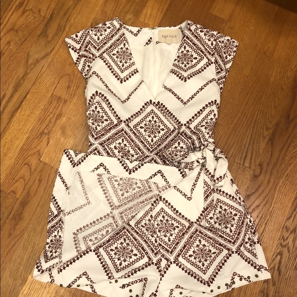 Patterned cross front romper with studded edge